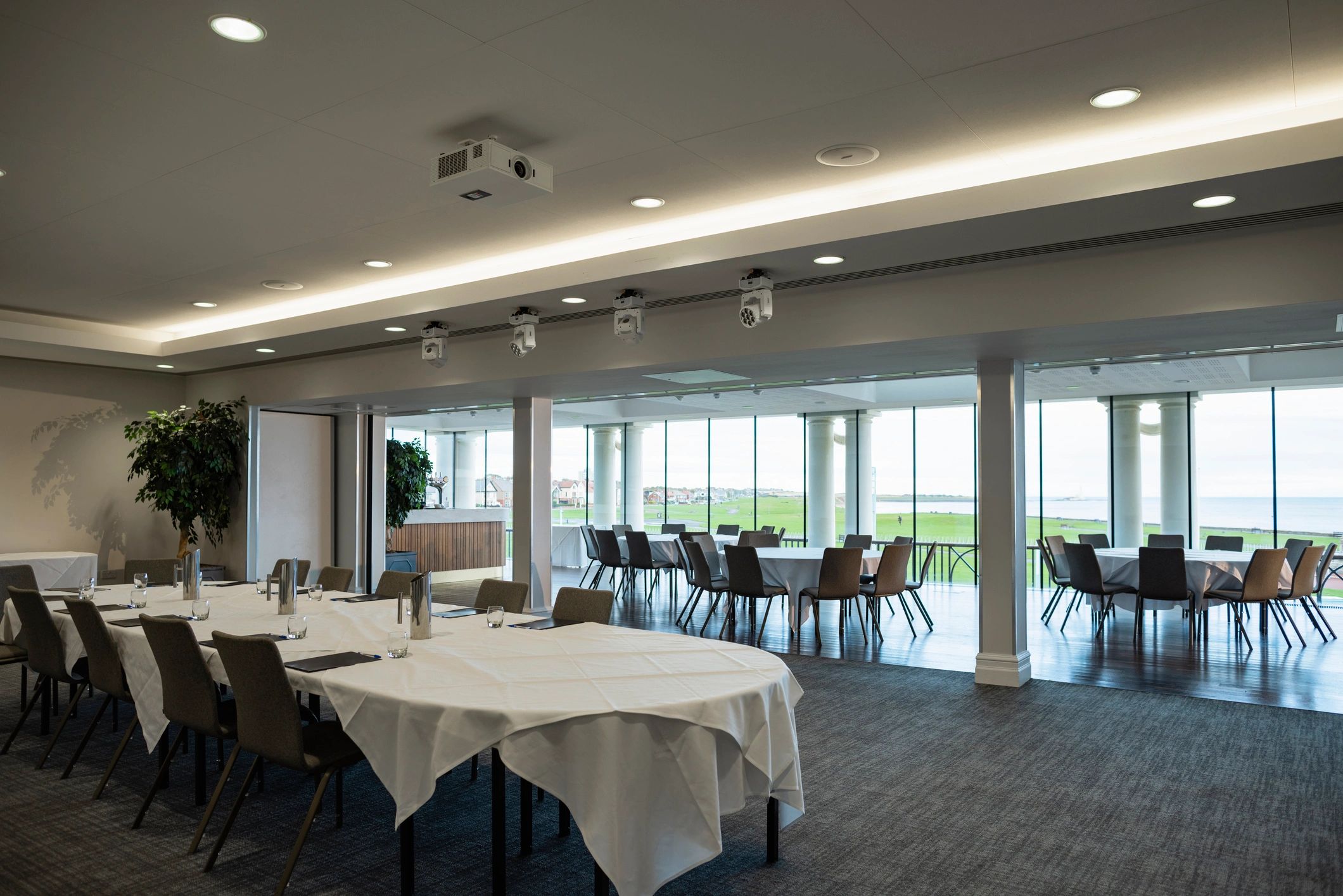 Elegant restaurant-style interior with round tables