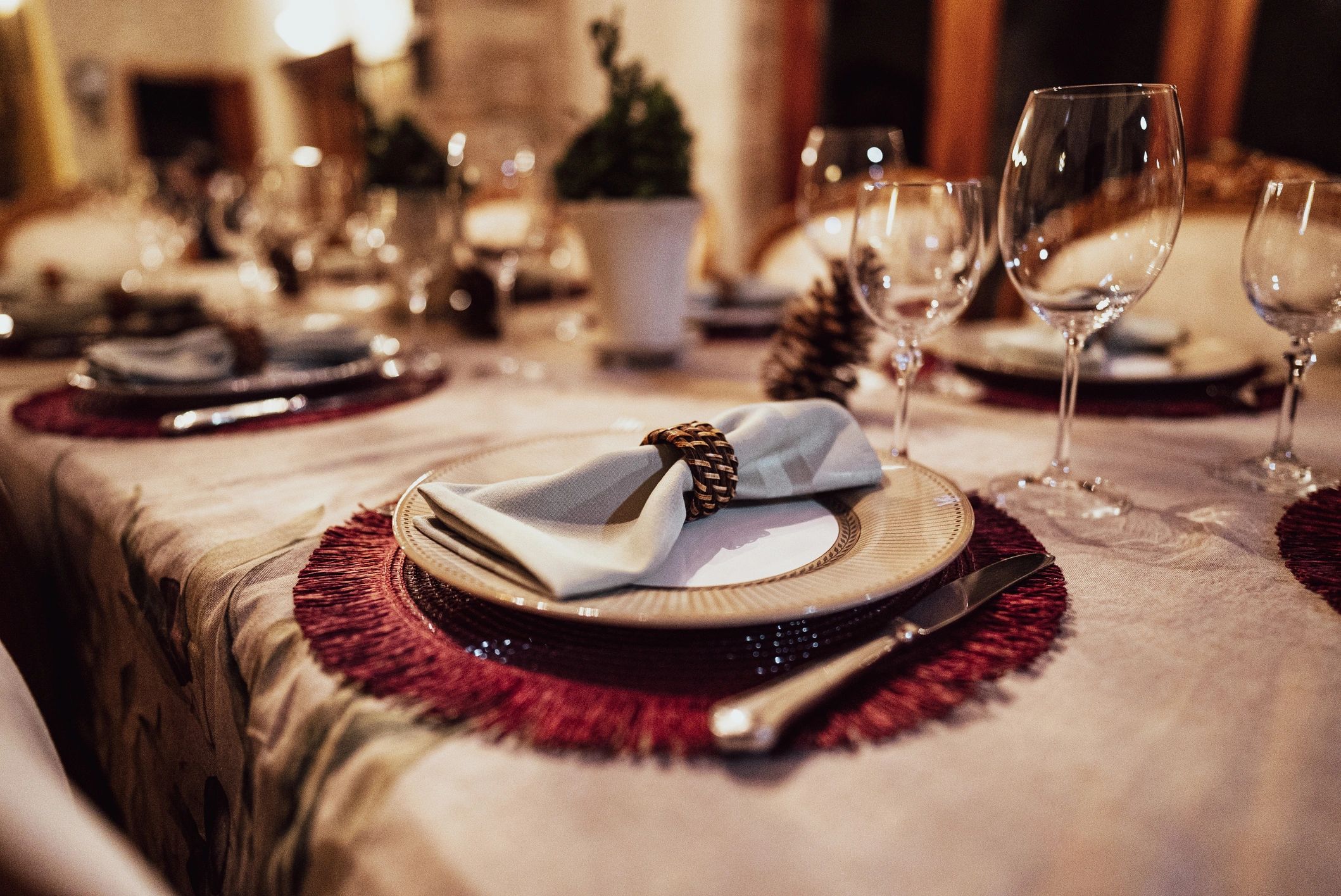 Close-up of candlelit dinner table details