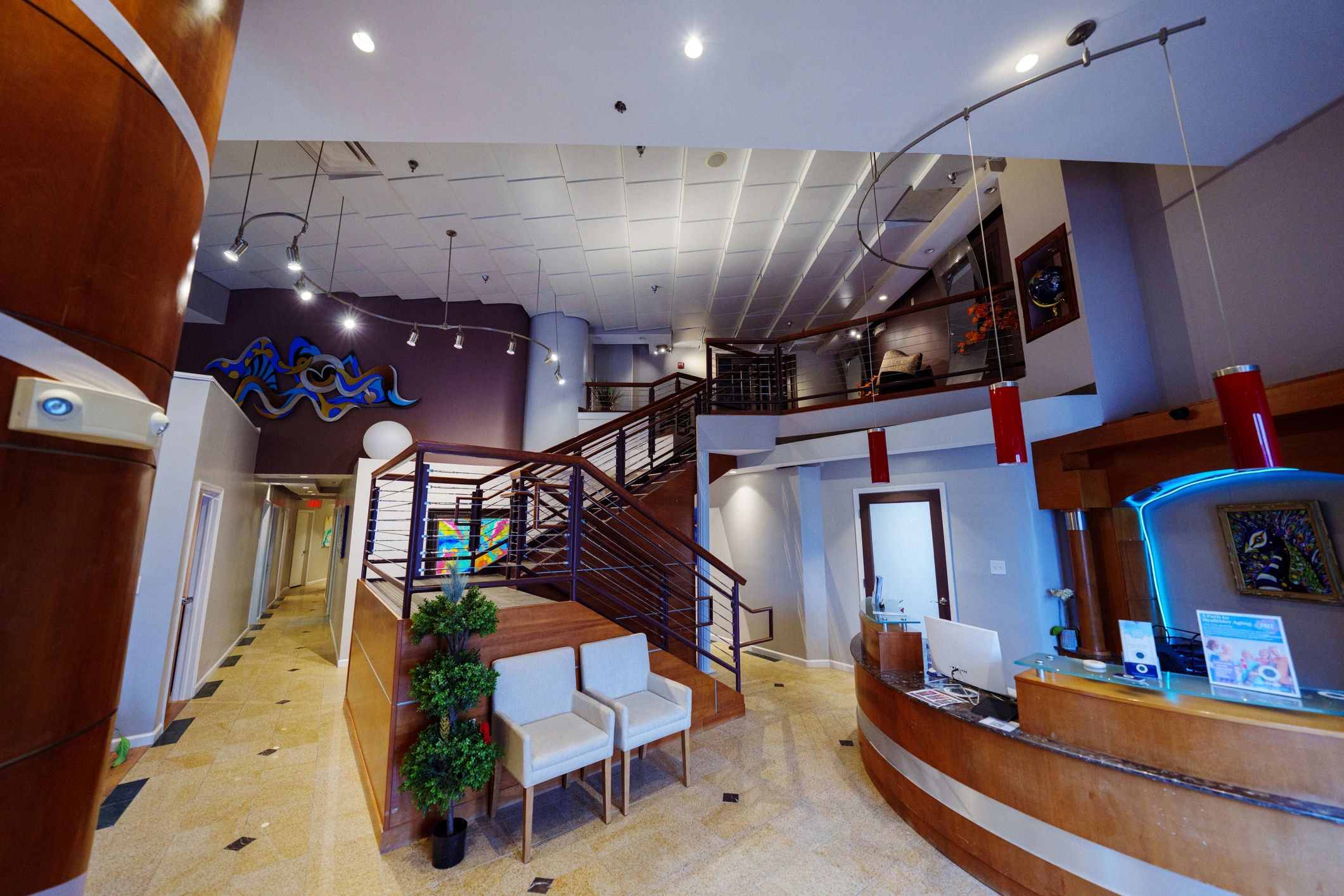 Grand reception lobby with vaulted ceiling and refined seating