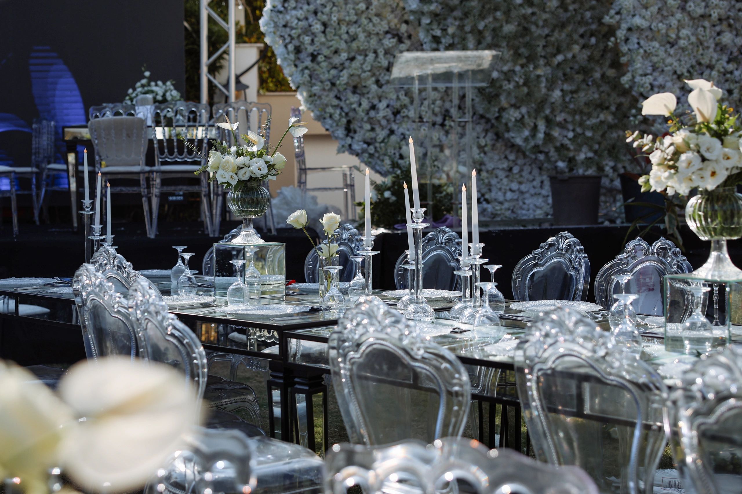 Event table setting with floral accents and glassware